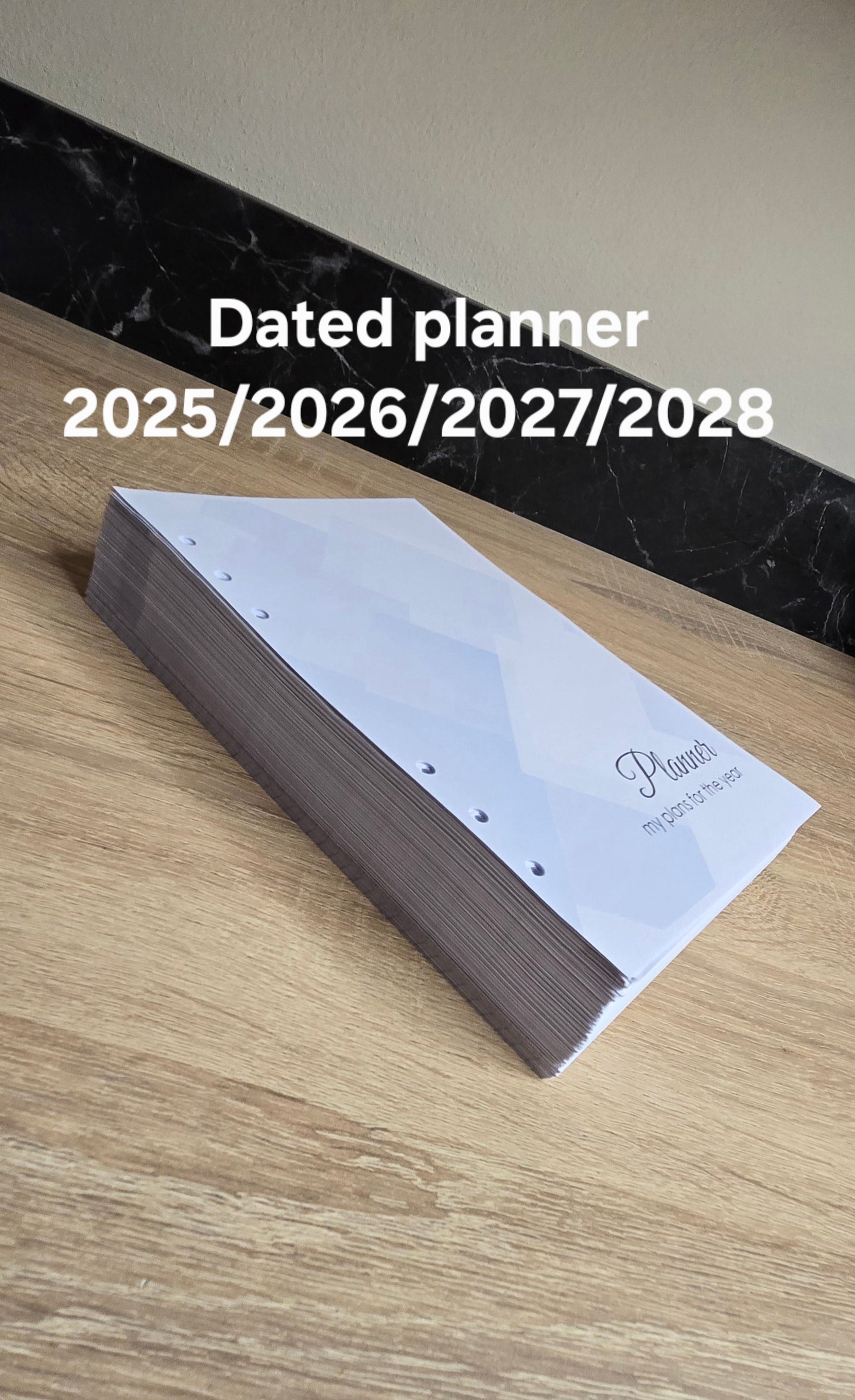 Dated day with time. Printed planner pages, size A5, dated 2025/2026/2027/2028 , dated notebook, many languages.