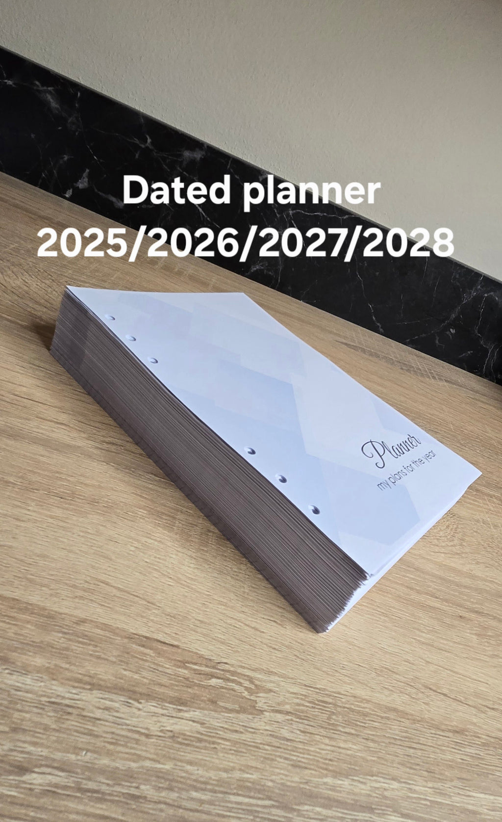 Dated day with time. Printed planner pages, size A5, dated 2025/2026/2027/2028 , dated notebook, many languages.